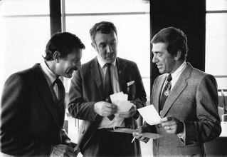 George with clients, 1960s. George with clients, 1960s.