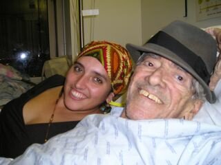 With grandaughter Eva, a month before his death.